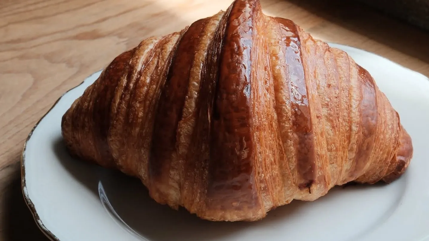 A croissant on a plate at Marzapane